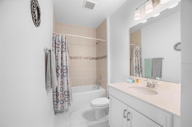 full bathroom featuring vanity, toilet, and shower / tub combo