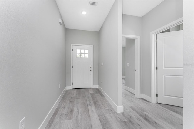 foyer entrance featuring light wood-type flooring