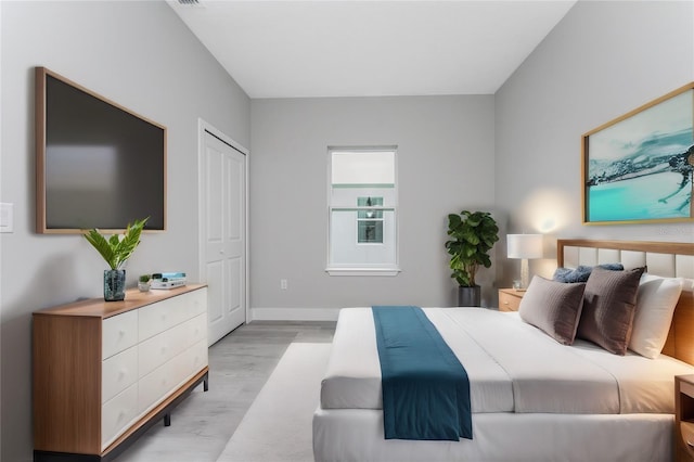 bedroom featuring light hardwood / wood-style flooring