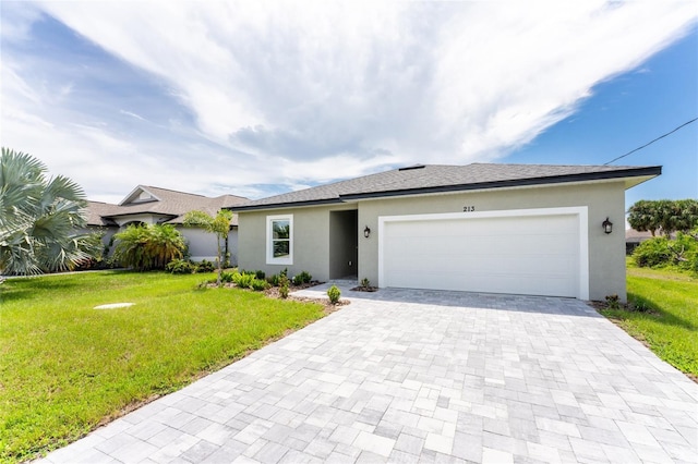 single story home featuring a front yard and a garage