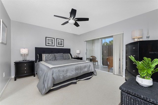 bedroom featuring access to outside, a ceiling fan, baseboards, and light carpet