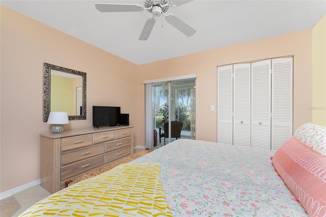 bedroom featuring access to exterior, a closet, baseboards, light colored carpet, and ceiling fan