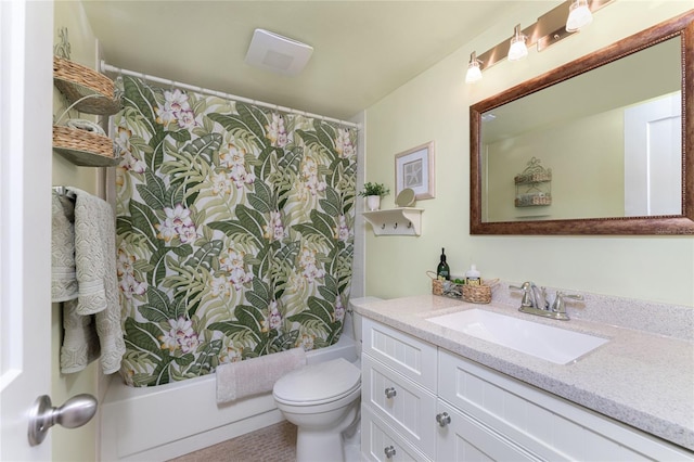 bathroom with shower / tub combo, toilet, and vanity