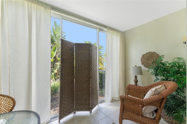 sitting room with tile patterned flooring