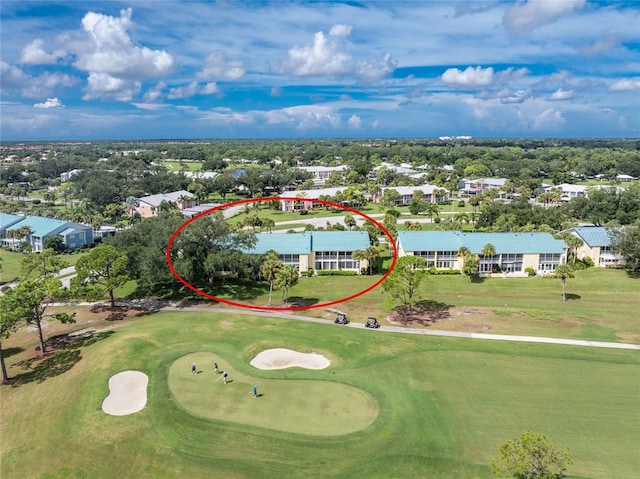 aerial view with view of golf course and a residential view