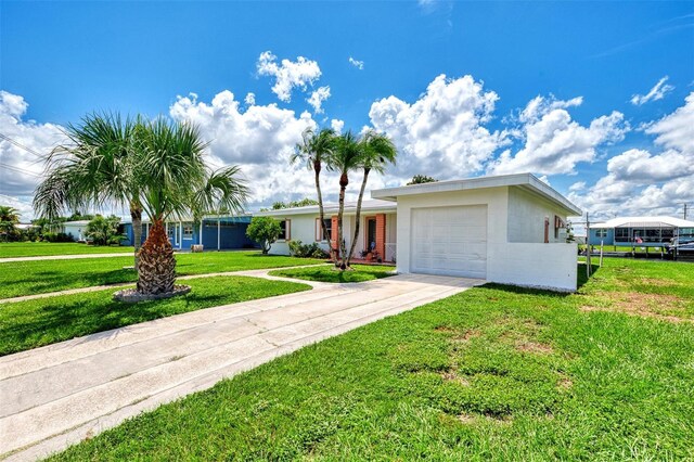 544 Lindley Ter, Port Charlotte, FL 33952 - single story home with a garage, driveway, and a front lawn