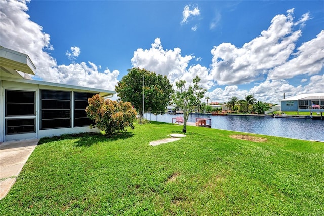 view of yard with a water view