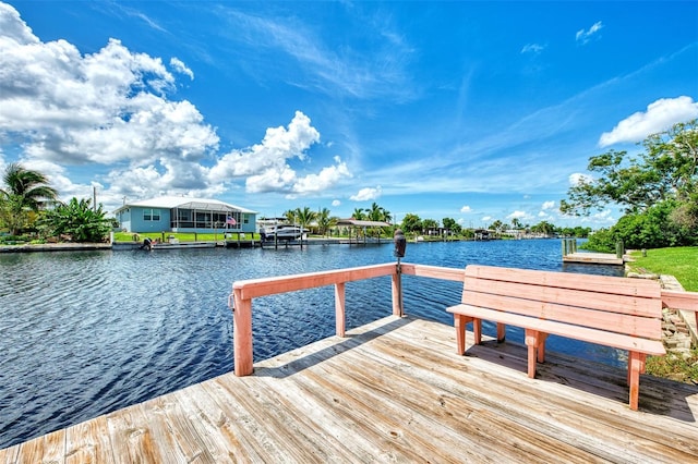 dock area featuring a water view