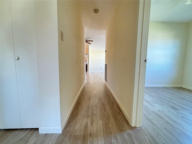 corridor featuring light wood-type flooring