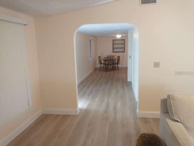 hall featuring light wood-type flooring