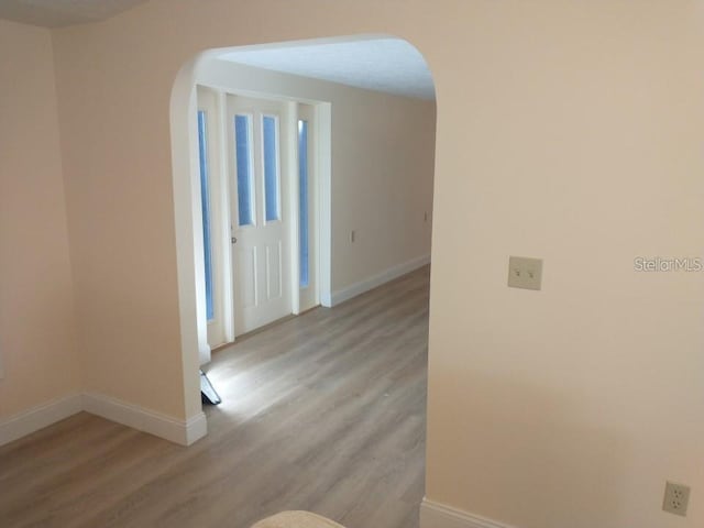 hall featuring light wood-type flooring