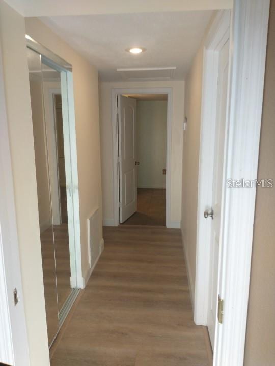 hallway featuring light hardwood / wood-style flooring