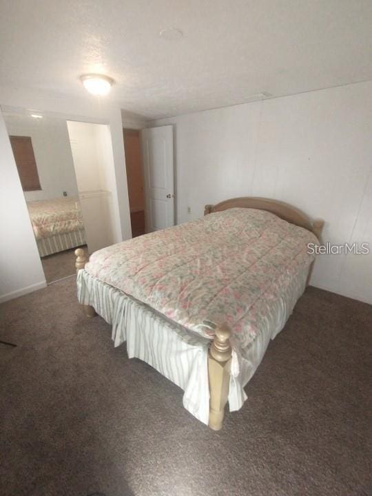 bedroom featuring carpet floors