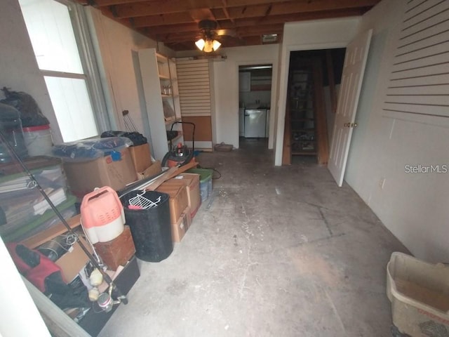 interior space with washer / clothes dryer and ceiling fan