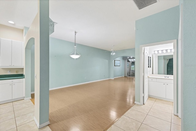 interior space featuring ceiling fan and light hardwood / wood-style flooring