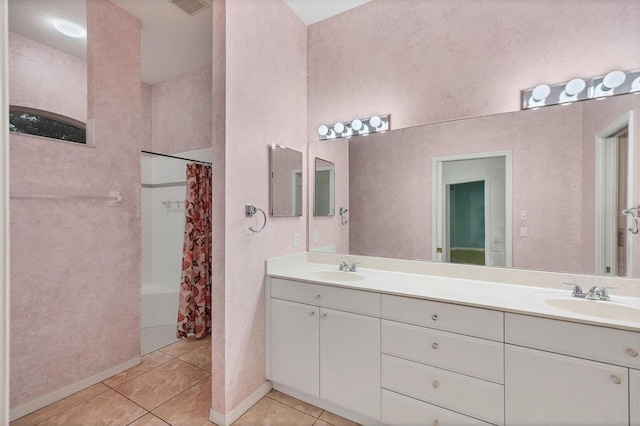 bathroom with tile patterned floors, vanity, and a shower with curtain