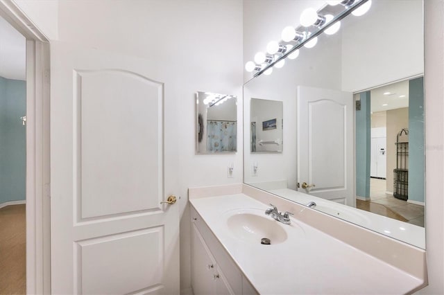 bathroom featuring tile patterned floors and vanity