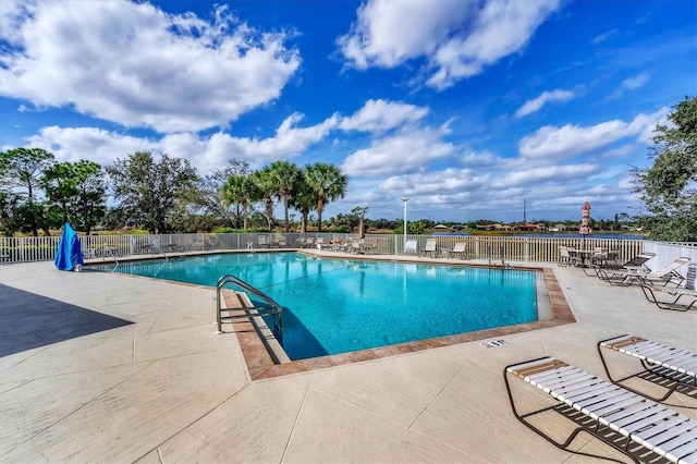 view of pool featuring a patio