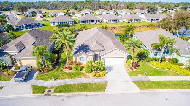 drone / aerial view with a residential view