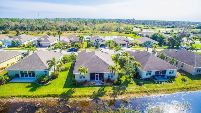 birds eye view of property with a residential view