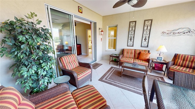 view of patio with a ceiling fan and an outdoor living space