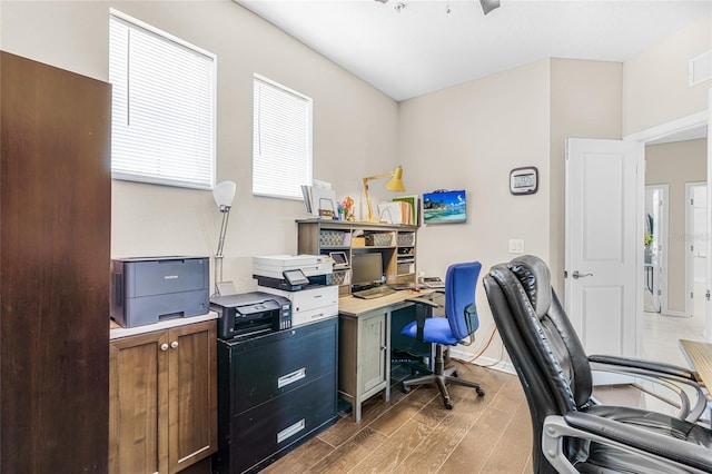 office space with hardwood / wood-style floors