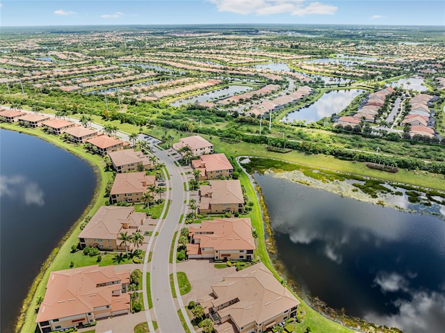 bird's eye view with a water view