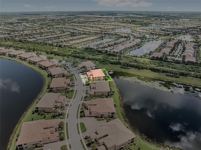 drone / aerial view featuring a water view