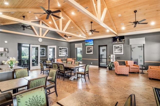 dining room featuring light parquet flooring, beam ceiling, wooden ceiling, and ceiling fan