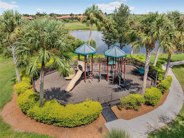 view of playground with a water view