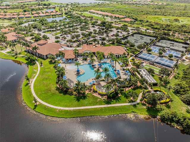 bird's eye view with a water view