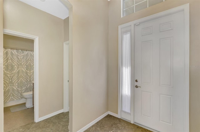 foyer with baseboards