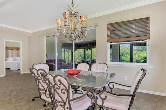 dining room featuring a chandelier, tile patterned flooring, and crown molding