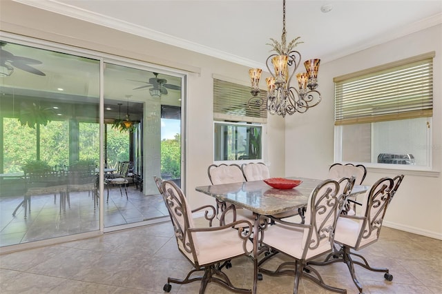 dining room with ornamental molding, an inviting chandelier, and a healthy amount of sunlight