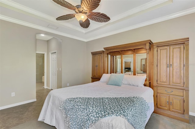 bedroom with ceiling fan, crown molding, and a tray ceiling