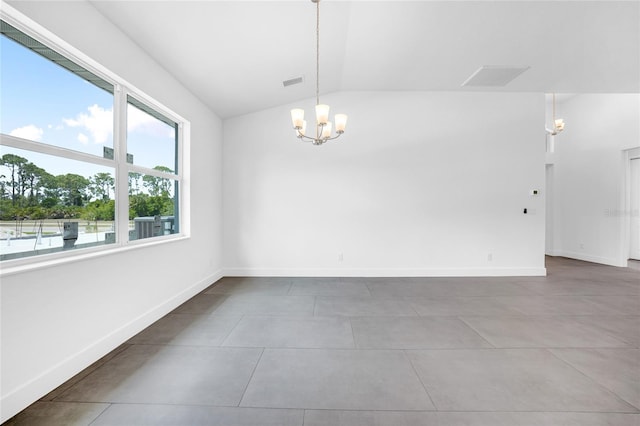 tiled spare room featuring lofted ceiling, baseboards, visible vents, and a notable chandelier