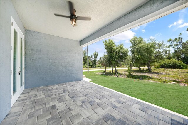 view of patio with ceiling fan