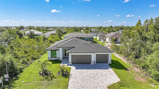 9262 Genesee St, Port Charlotte, FL 33981 - view of front facade with an attached garage, stucco siding, decorative driveway, a shingled roof, and a front yard