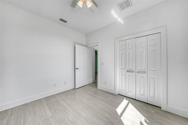 9262 Genesee St, Port Charlotte, FL 33981 - unfurnished bedroom with a closet and a ceiling fan