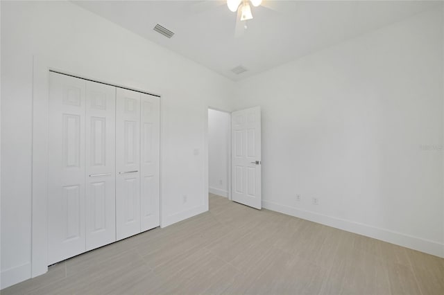 9262 Genesee St, Port Charlotte, FL 33981 - unfurnished bedroom with a closet and a ceiling fan