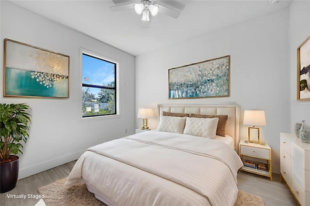 9262 Genesee St, Port Charlotte, FL 33981 - bedroom featuring light wood-type flooring and ceiling fan