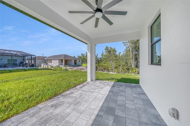 9262 Genesee St, Port Charlotte, FL 33981 - view of patio featuring ceiling fan and a residential view