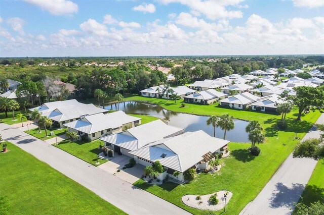 drone / aerial view featuring a water view