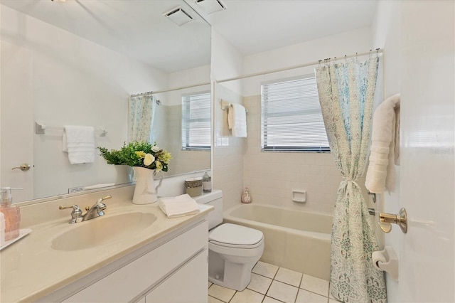 full bathroom featuring tile patterned flooring, shower / bath combo, vanity, and toilet