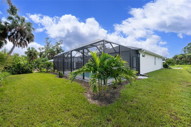 view of yard featuring a lanai