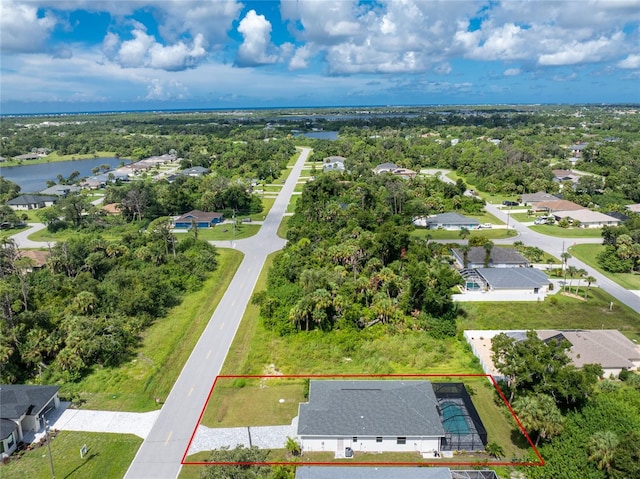 drone / aerial view featuring a water view