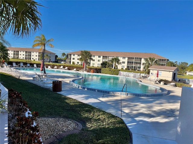 view of swimming pool featuring a patio