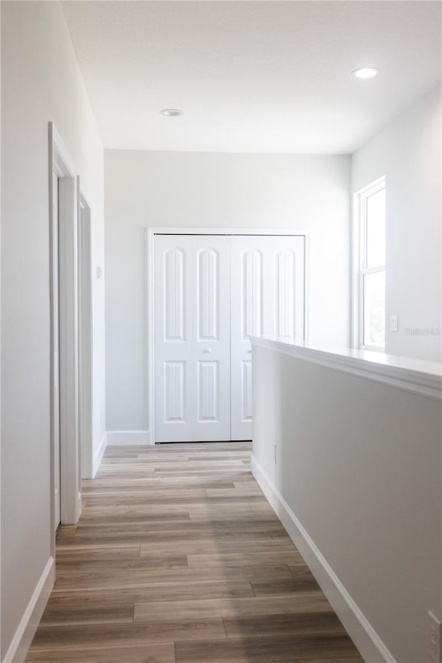 hallway featuring hardwood / wood-style floors