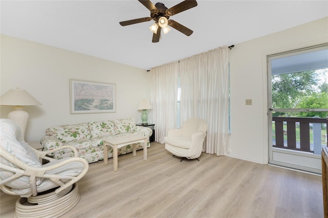 3 Quails Run Blvd Unit 8, Englewood, FL 34223 - living room featuring light wood-style floors and ceiling fan