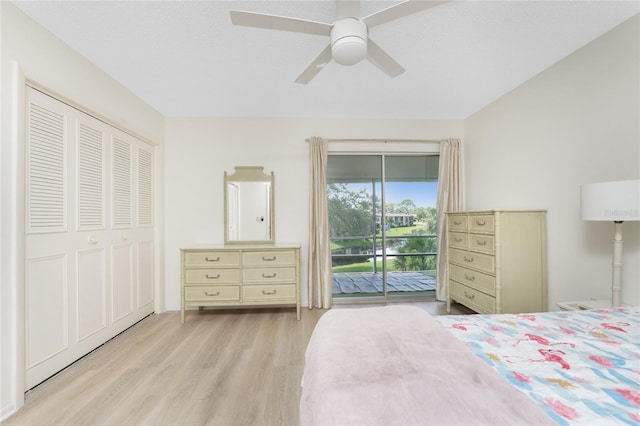 bedroom with ceiling fan, light wood-type flooring, access to outside, and a textured ceiling